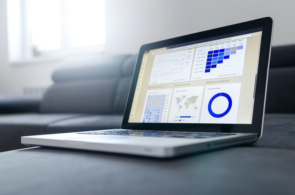 Charts and graphs displayed on a laptop screen