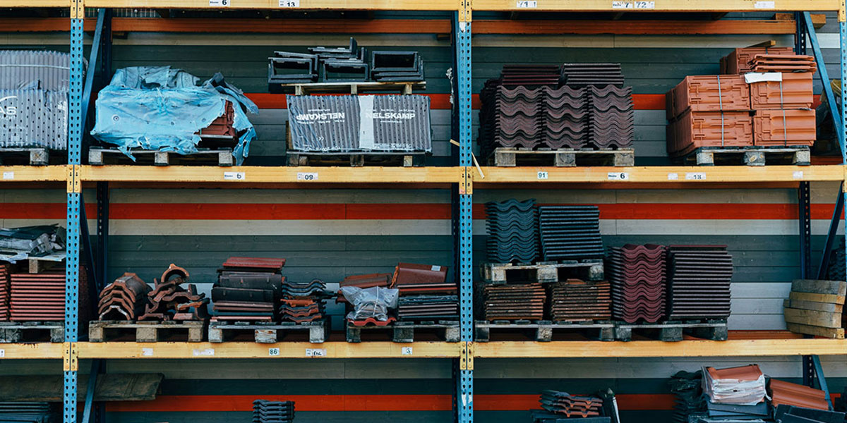 A warehouse shelf containing many types of construction materials